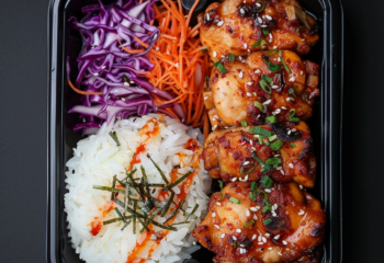 Glazed Chicken Yakitori Thighs over Steamed Rice and Vegetables